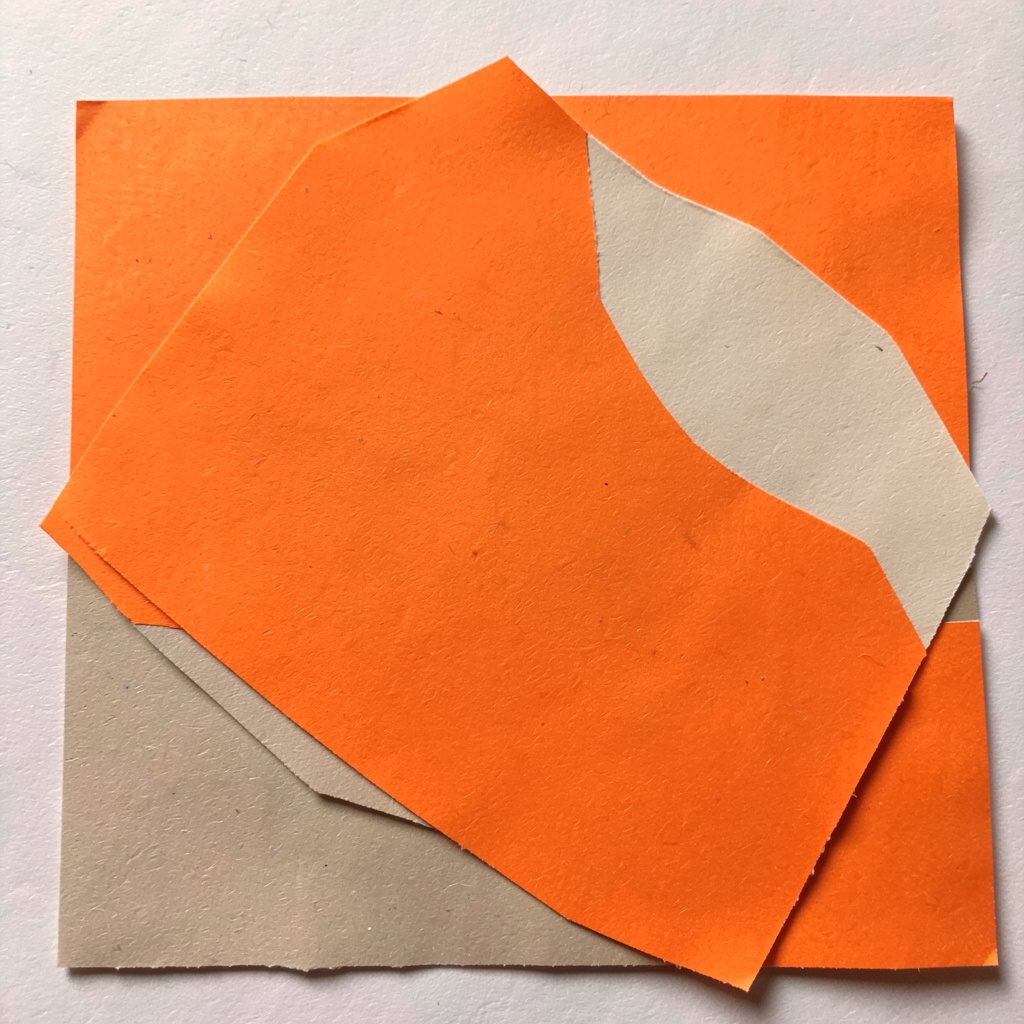 Soft paper cut-out tile in muted beige and taupe