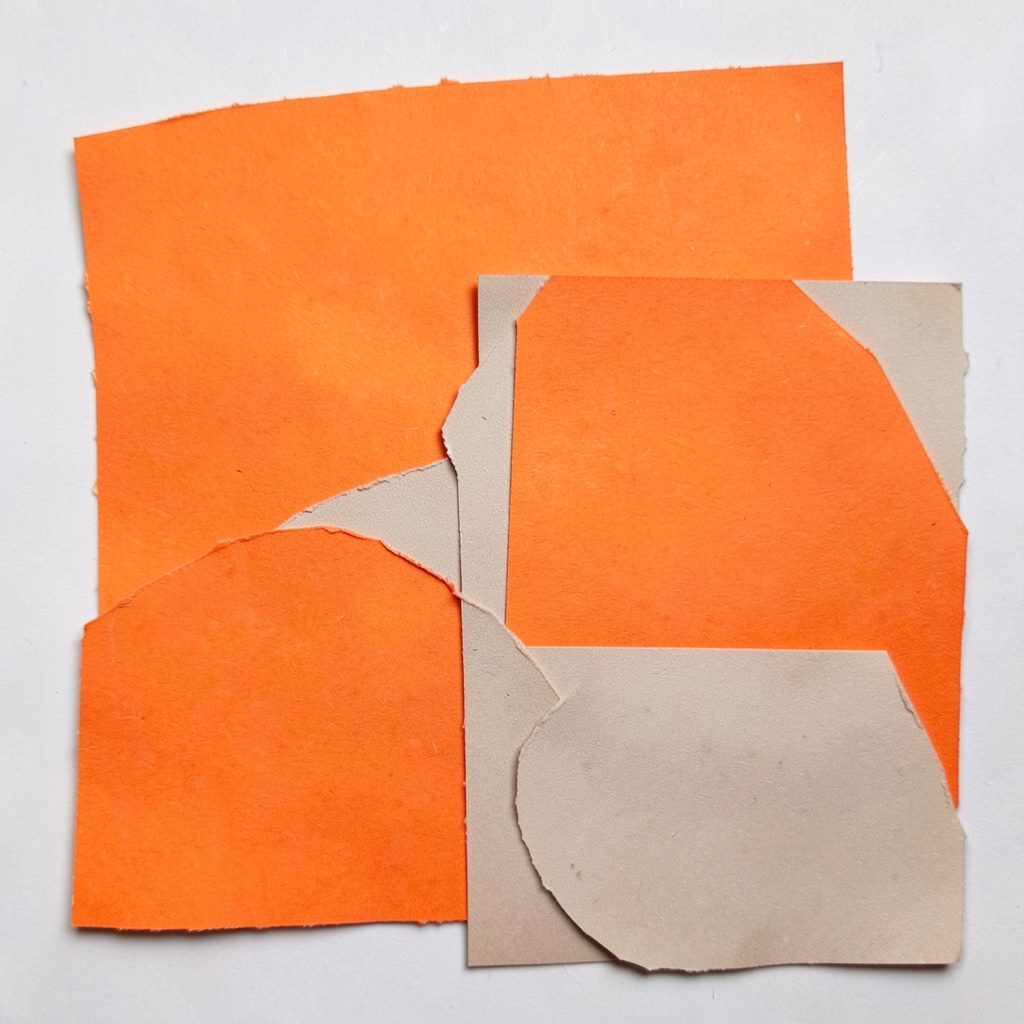 Soft paper cut-out tile in muted olive and beige